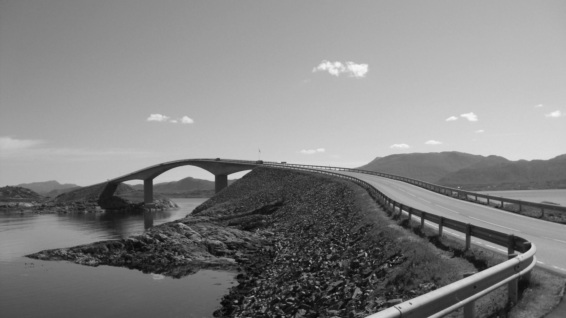 A narrow road bridging two pieces of land over open water — the Atlantic Ocean Road in Norway